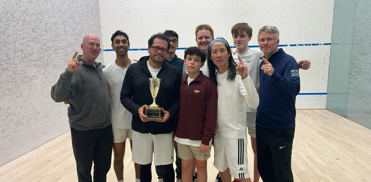 Richmond City League team celebrating with a championship trophy